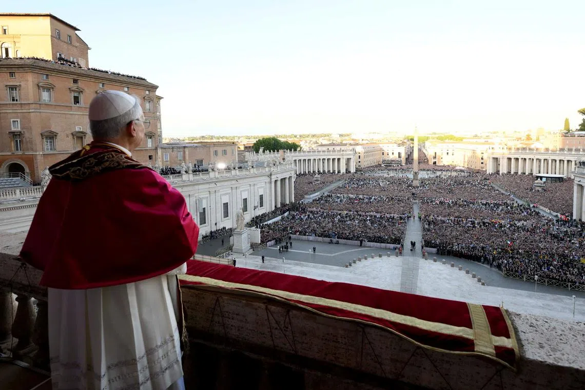 Newly elected Pope Leo XIV, Cardinal Robert Prevost of the United States looks on from the balcony of St. Peter's Basilica, at the Vatican, May 8, 2025. Vatican Media/Francesco Sforza/Handout via REUTERS
