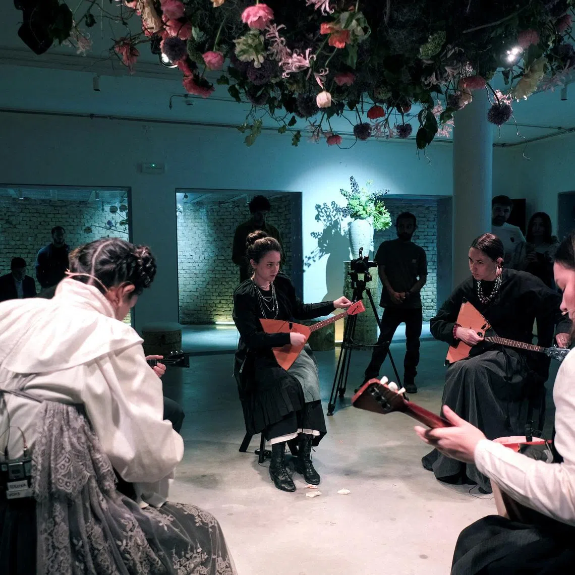 FILE PHOTO: Artists perform \"The Tree Rooted in the Sky\" at the Russian Pavilion during the preview of the Venice Art Biennale in Venice, Italy, May 5, 2026. REUTERS/Manuel Silvestri/File Photo