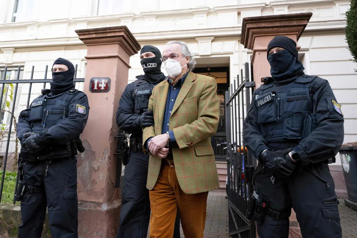 German special police forces detain Heinrich XIII Prince Reuss as part of nationwide raids against members of a far-right "terror group" suspected of planning an attack on parliament. 