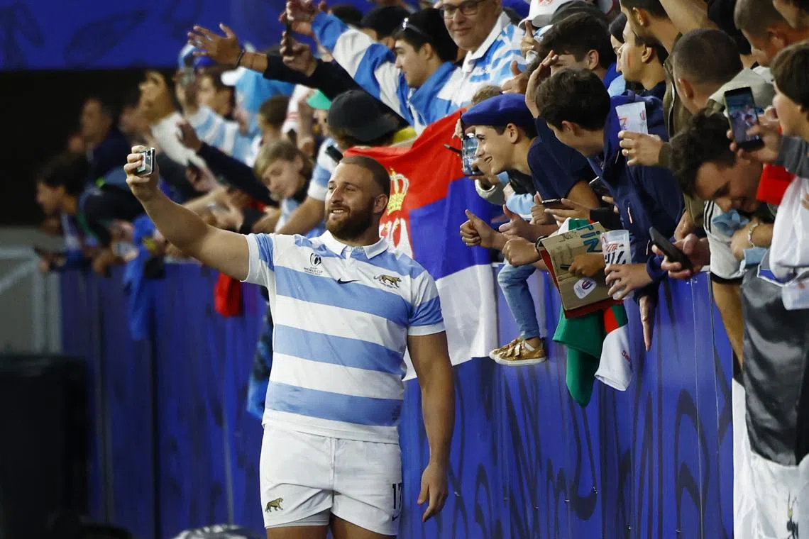 FILE PHOTO: Rugby Union - Rugby World Cup 2023 - Pool D - Argentina v Samoa - Stade Geoffroy-Guichard, Saint-Etienne, France - September 22, 2023 Argentina's Mayco Vivas celebrates with fans after the match REUTERS/Sarah Meyssonnier