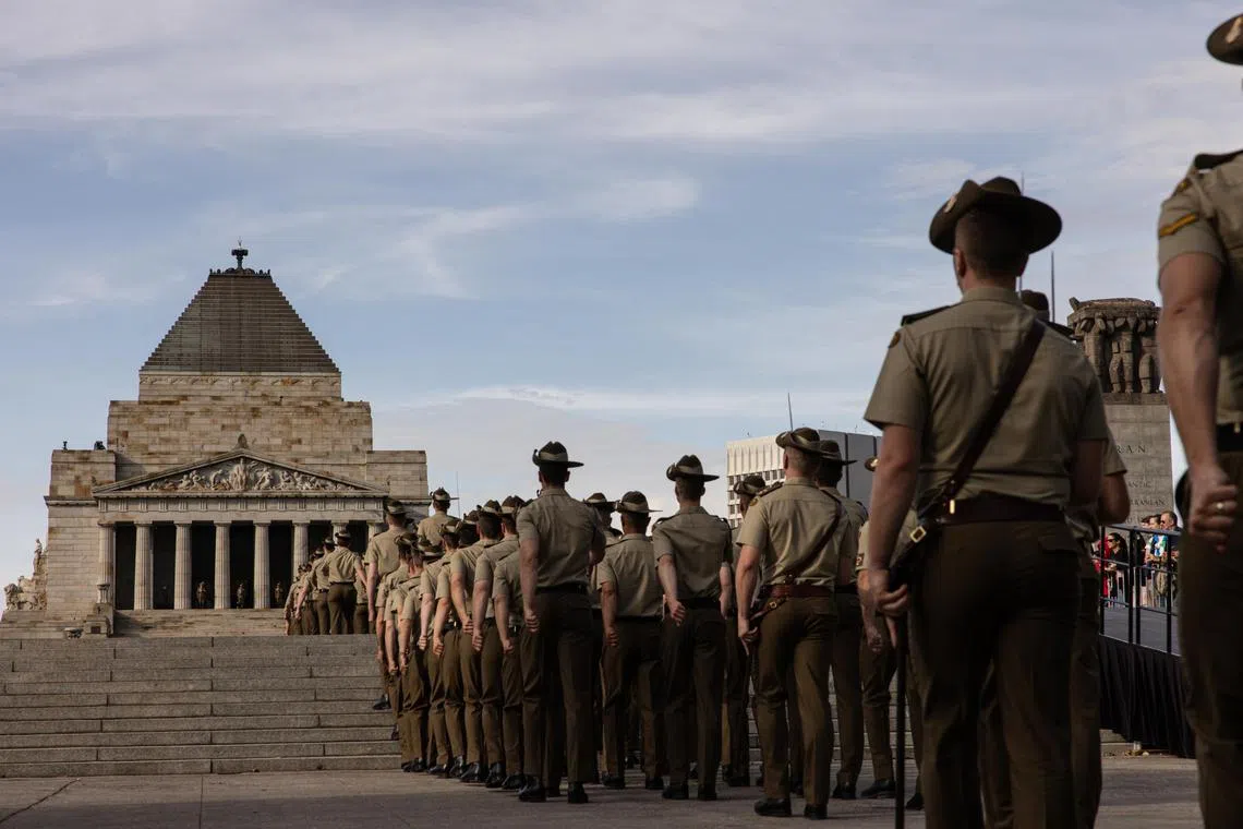 Australian Defence Force (ADF) personnel participate in the Anzac Day March towards the Shrine Of Remembrance in Melbourne, Australia.