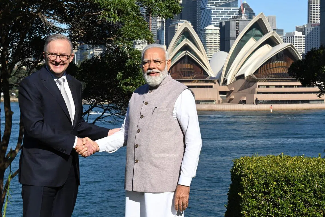 Indian PM Narendra Modi (right) and his Australian counterpart Anthony Albanese also signed a migration deal.