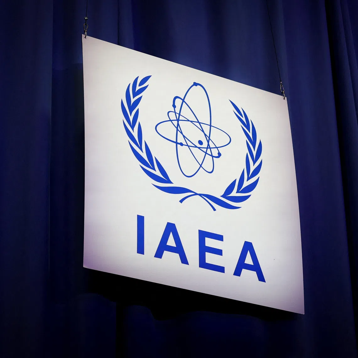 An International Atomic Energy Agency (IAEA) sign at the opening of the IAEA General Conference at the agency's headquarters in Vienna, Austria, September 15, 2025. REUTERS/Lisa Leutner