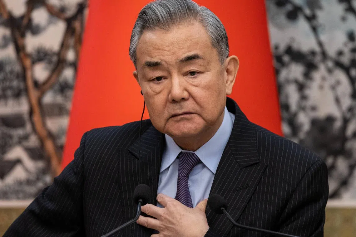 FILE PHOTO: Chinese Foreign Minister Wang Yi participates in a press conference in Beijing, China, 27 March 2025.     JESSICA LEE/Pool via REUTERS/File Photo