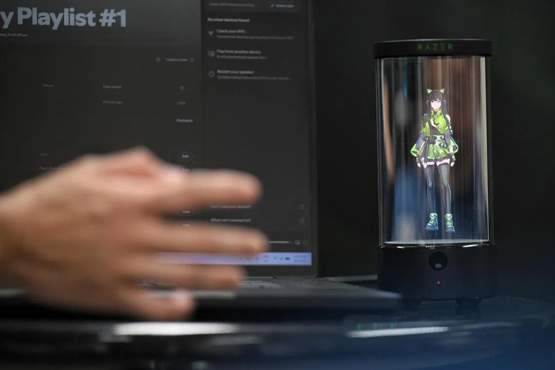 The holographic avatar of Kira advised users on commute lengths and dining options, during a demonstration at the launch of the Razer-NUS Joint AI Research Lab on Aug 5.