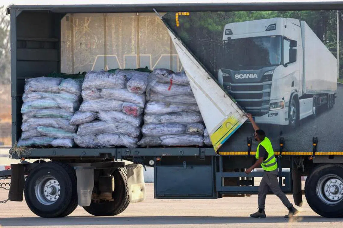 A truck carrying humanitarian aid drives through the Kerem Shalom crossing between southern Israel and the Gaza Strip, on May 22.