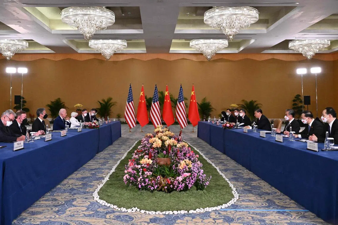 US President Joe Biden (left, centre) and Chinese President Xi Jinping meeting in Bali together with their teams on Monday.
