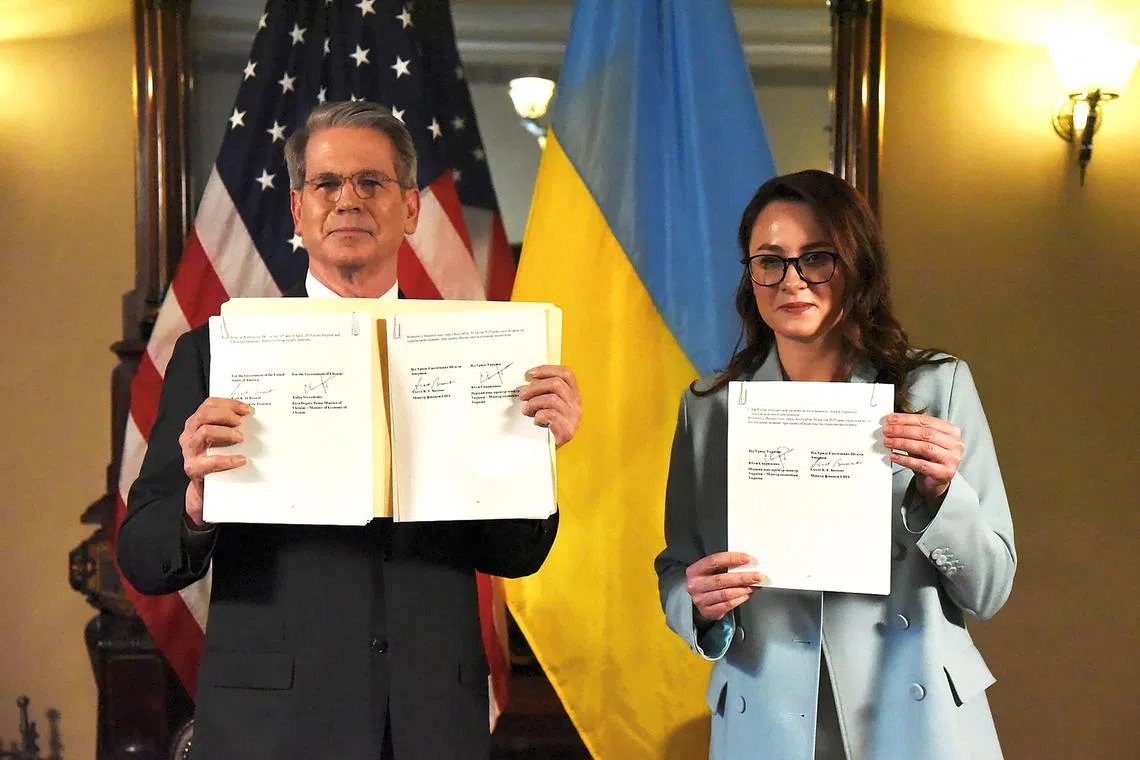 US Treasury Secretary Scott Bessent (left) and Ukrainian Deputy Prime Minister Yulia Svyrydenko attending a ceremony to sign a minerals deal, in Washington, on April 30. 
