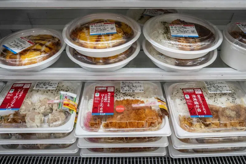Japan's love of plastic is seen here in the rows of bento boxes at a convenience store.