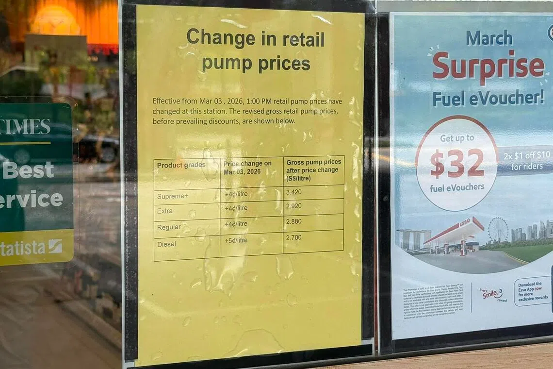 A notice displayed at an Esso outlet in Ang Mo Kio informed motorists of raised fuel prices.