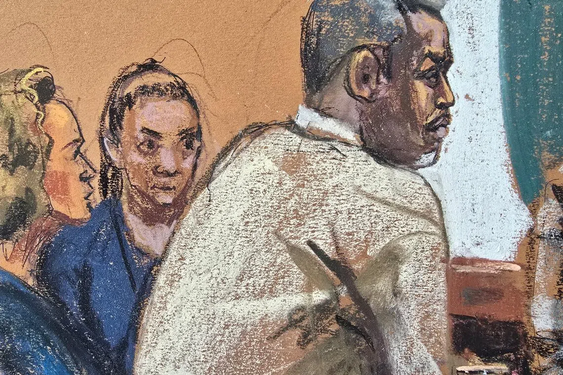 Sean \"Diddy\" Combs speaks to his lawyers before the start of the day's proceedings during Combs' sex trafficking trial in New York City, New York, U.S., June 5, 2025 in this courtroom sketch. REUTERS/Jane Rosenberg