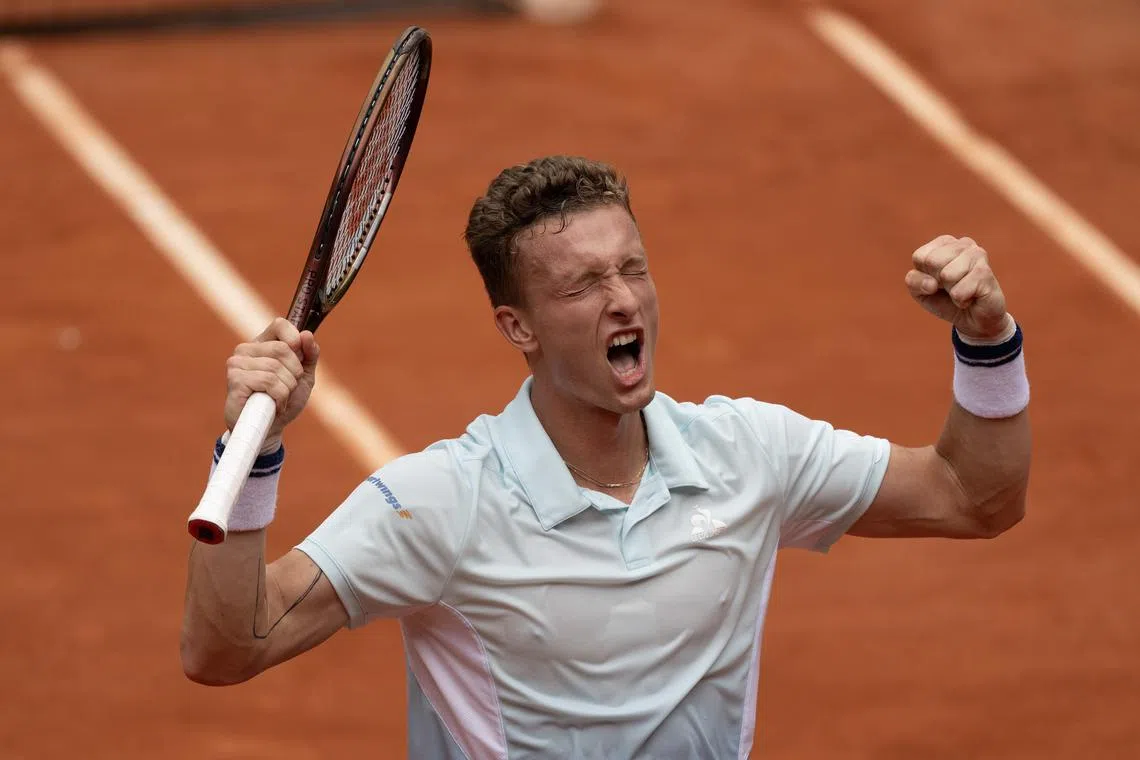 FILE PHOTO: May 31, 2025; Paris, FR; Jiri Lehecka of the Czech Republic celebrates winning a game during his match against Jannik Sinner of Italy on day seven at Roland Garros Stadium. Mandatory Credit: Susan Mullane-Imagn Images/File Photo