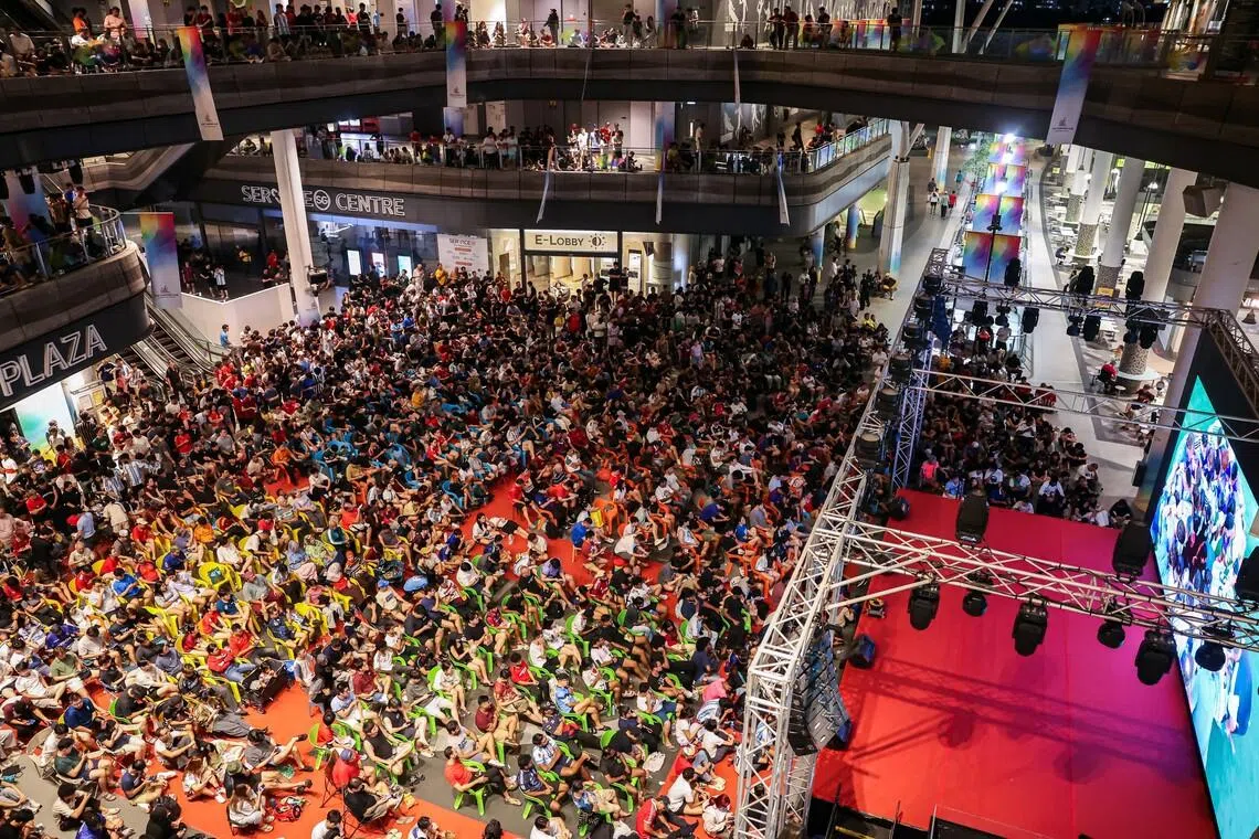 Fans gathering at Our Tampines Hub to watch the live screening of the FIFA World Cup 2026 final between Argentina and Spain in the early hours of July 20, 2026. ST PHOTO: BRIAN TEO