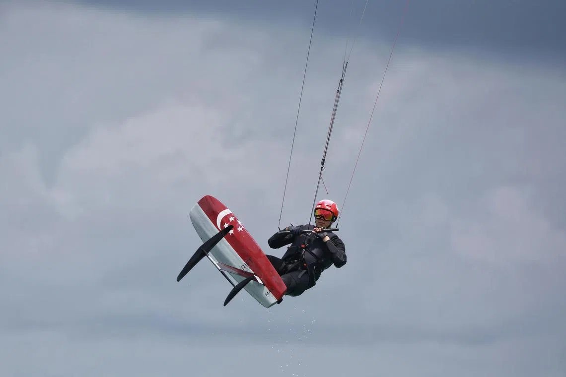 Profile and action shots of Singaporean kitefoiler Maximilian Maeder during training at Changi Beach on Feb 11, 2023. He has been nominated for the ST Athlete of the Year.