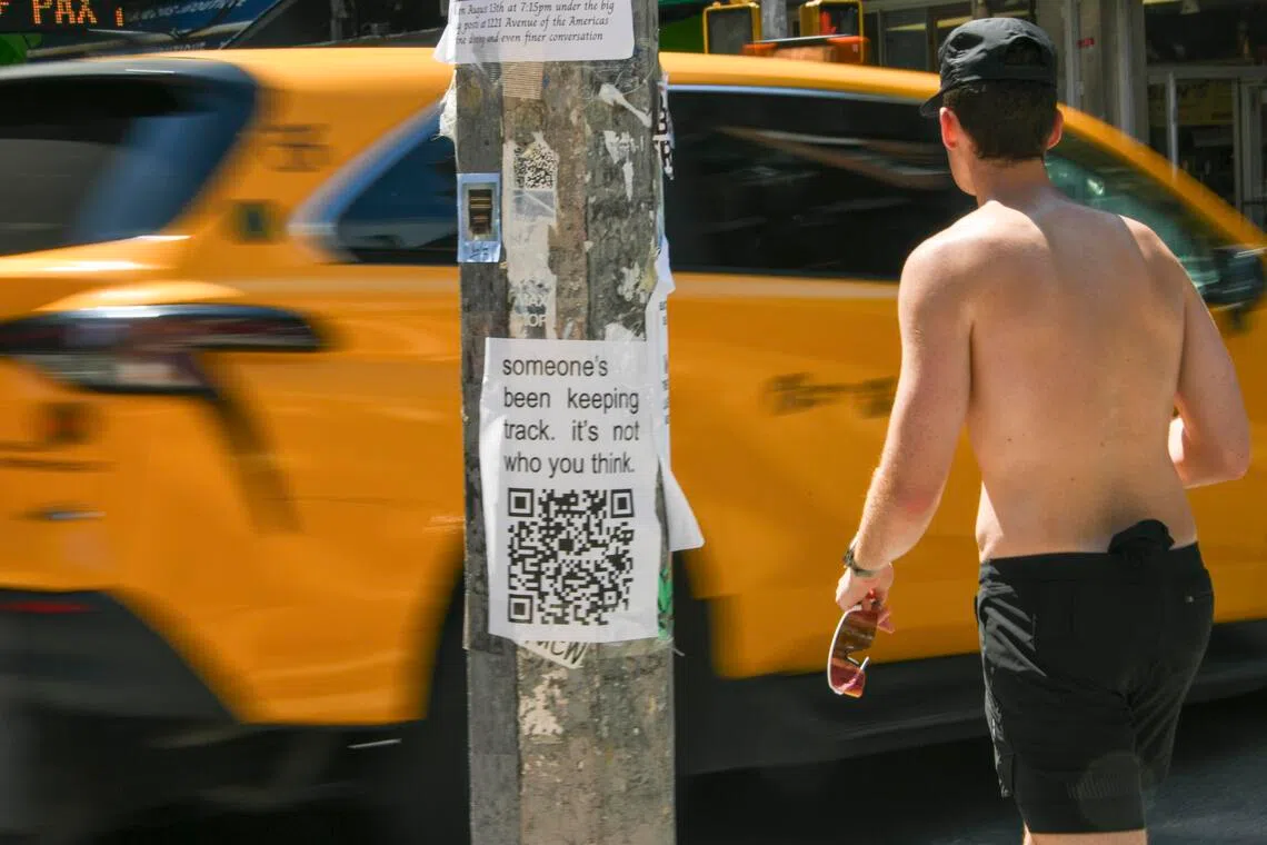 A flier on a pole in New York, Aug. 2, 2025. They’re not just for missing pets or yard sales. Fliers these days are for internet memes, self-promotion and extremely esoteric messages. (Dolly Faibyshev/The New York Times)