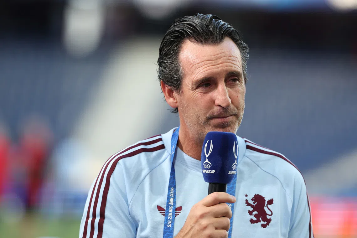 Aston Villa manager Unai Emery speaking to the media during a pitch walkaround ahead of the UEFA Super Cup.