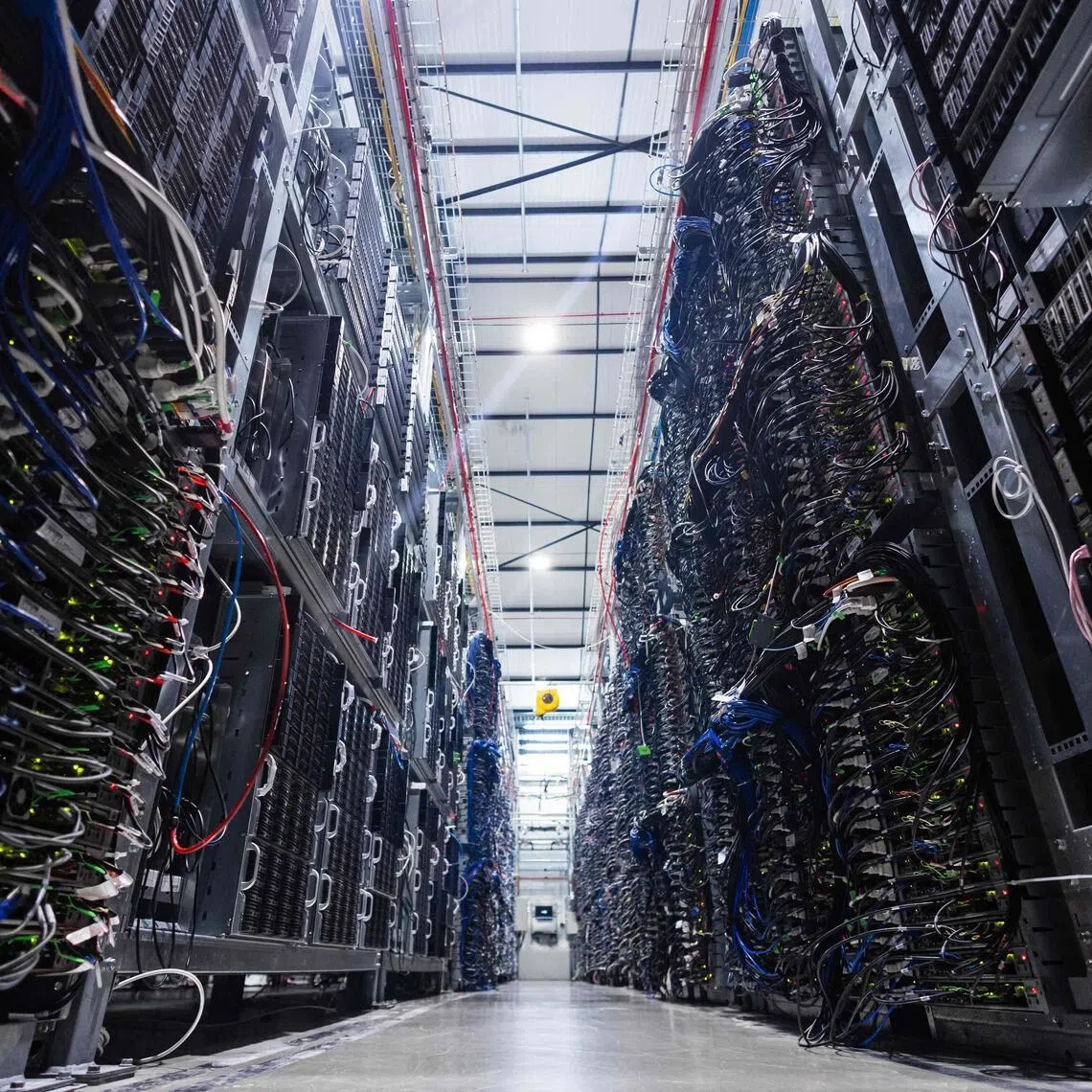 (FILES) This photograph shows servers inside the data centre of French company OVHcloud in Roubaix, northern France on April 3, 2025. In northern France Hauts-de-France region, data centre projects are springing up, with massive investments that could turn it into an “AI valley”, thanks to its geographical advantages and a tried-and-tested approach already used for its “battery valley”. (Photo by Sameer Al-DOUMY / AFP)