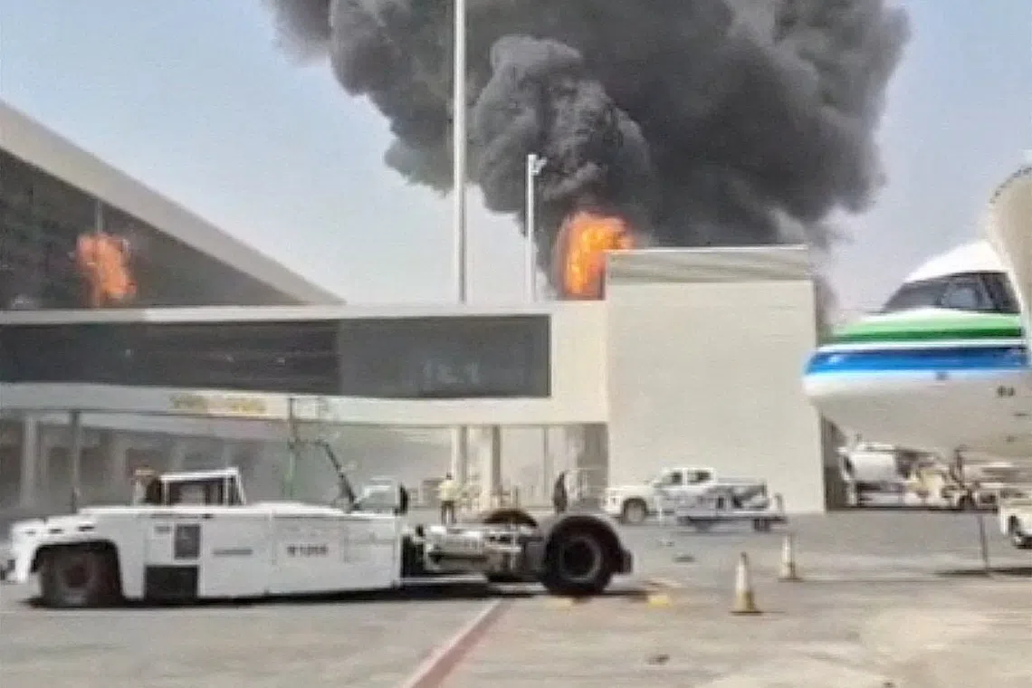 FILE PHOTO: Smoke and flames rise from King Khalid Airport, after Yemen's Iran-backed Houthis said they attacked the airport, in Riyadh, Saudi Arabia, October 8, 2026, in this screengrab obtained from a social media video. Social Media/via REUTERS  THIS IMAGE HAS BEEN SUPPLIED BY A THIRD PARTY. NO RESALES. NO ARCHIVES. NEWS USE ONLY. BEST QUALITY AVAILABLE.  Verification lines: The location was verified as Riyadh, Saudi Arabia, from the airport buildings, light poles, and painted tarmac markings which matched satellite imagery. Coordinates: 24.952651844496998, 46.70783371105999 Smoke was seen rising from a stationary aircraft at Riyadh airport on Thursday, according to a witness and three people briefed on the matter. There was no immediate official confirmation from Saudi authorities on the reported incident. No versions of the video were found posted online before October 8./File Photo