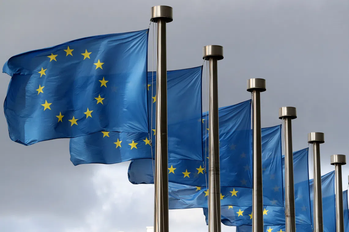 EU flags flutter in front of the European Commission headquarters in Brussels, Belgium October 2, 2019. REUTERS/Yves Herman