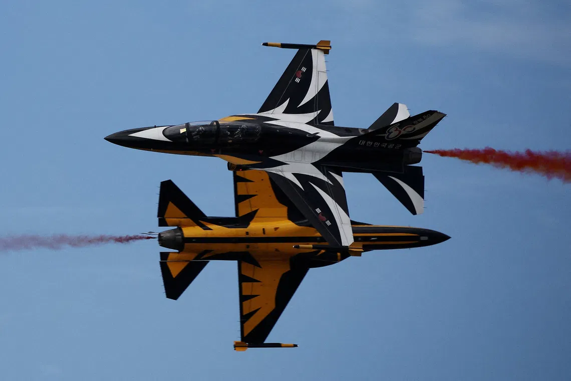 The South Korean Air Force Black Eagles aerobatic team performing during Seoul International Aerospace & Defense Exhibition (ADEX) in Seongnam, South Korea, Oct 17, 2025. 