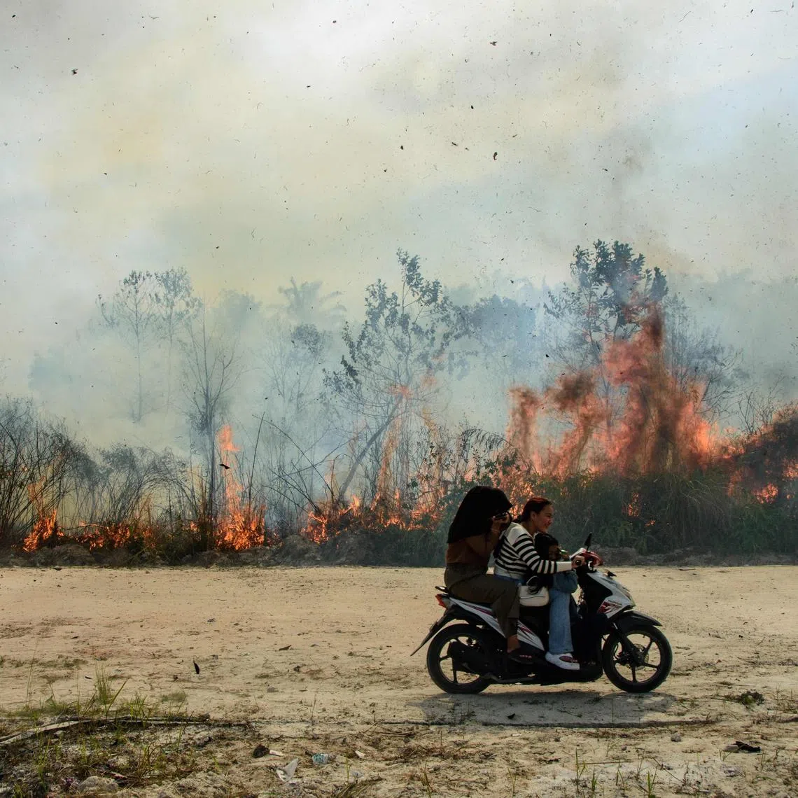 A wildfire in Karya Indah, Indonesia’s Riau province, on July 19. More than 140 forest and peatland fires were reported in Riau in central Sumatra over the weekend.