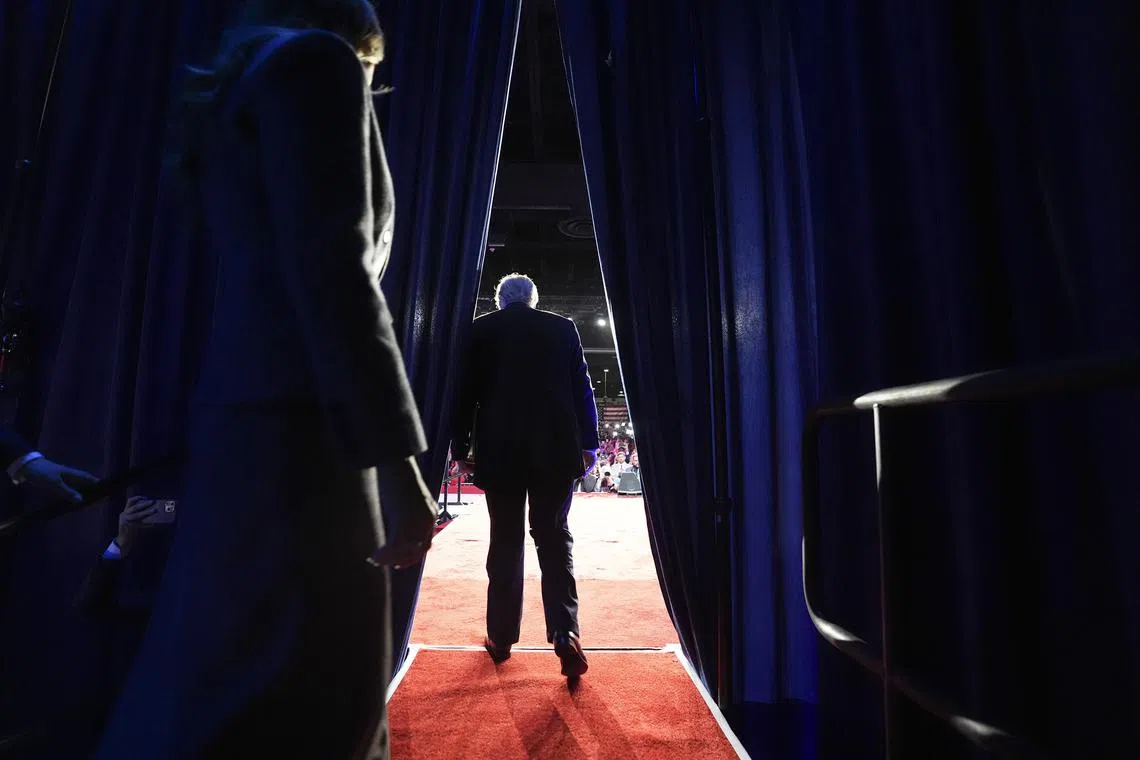 Former President Donald Trump, the Republican presidential nominee, walking on stage with Melania Trump during an election night event at the Palm Beach County Convention Centre in West Palm Beach, Florida, on Nov 6, 2024. 