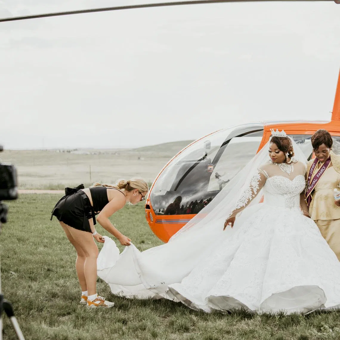 A photo provided by Chelsea Beamer Photography of a wedding at the Arapahoe County Fairgrounds in Colorado in 2022. The groom arrived via helicopter to the wedding.