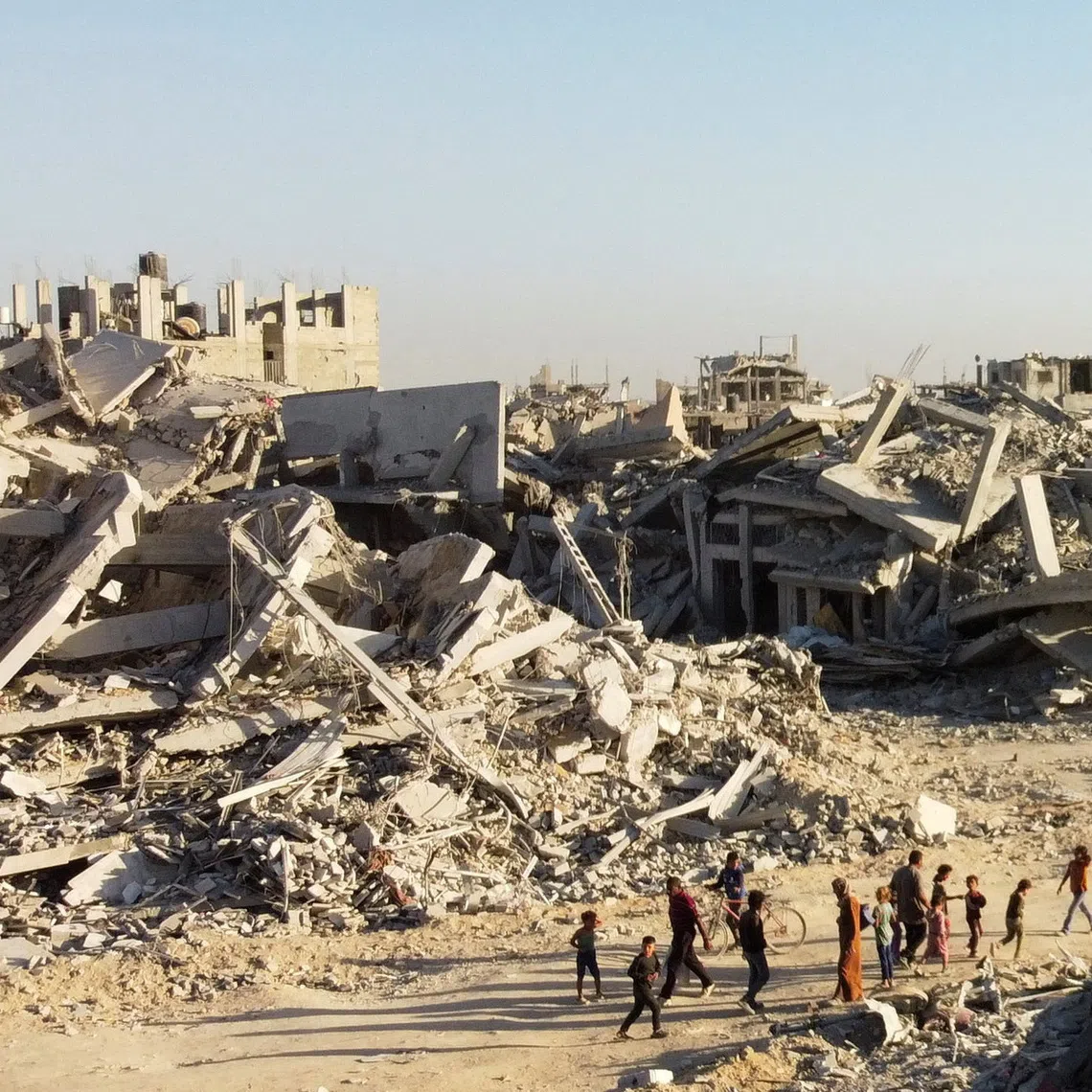 A drone view shows the destruction in a residential neighborhood, after the withdrawal of the Israeli forces from the area, amid a ceasefire between Israel and Hamas in Gaza, in Gaza City, October 25, 2025. REUTERS/Dawoud Abu Alkas