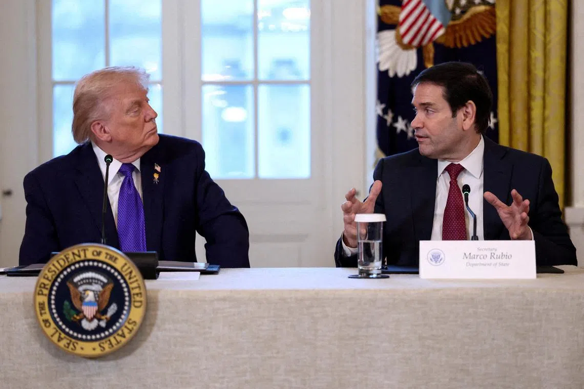 U.S. President Donald Trump and Secretary of State Marco Rubio attend a meeting with oil industry executives, at the White House in Washington, D.C., U.S., January 9, 2026. REUTERS/Kevin Lamarque