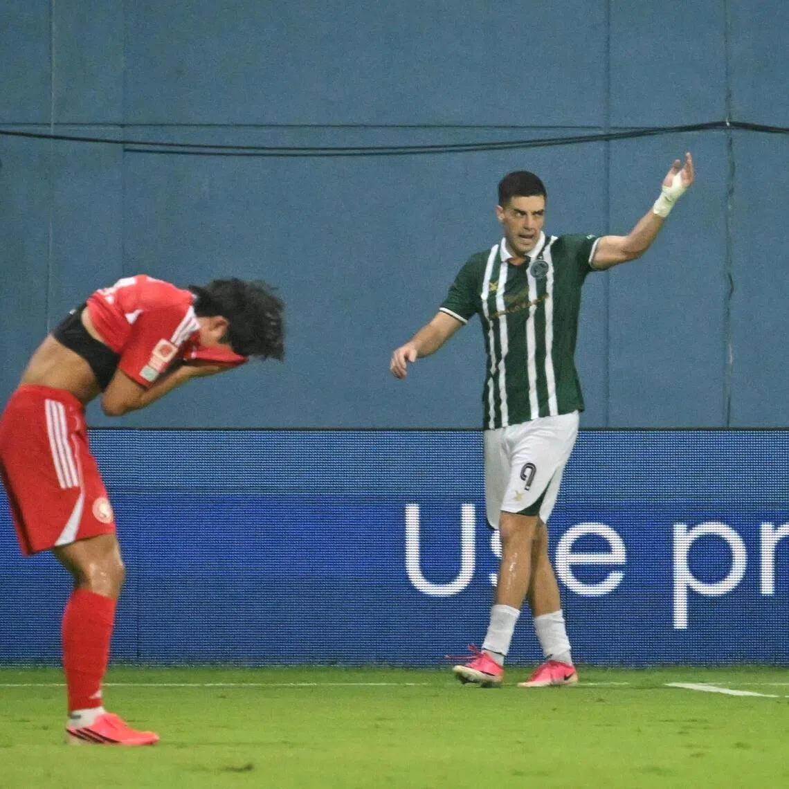 Dejan Racic (right) opened his account for his new team by making it 3-1 in the 38th minute.
