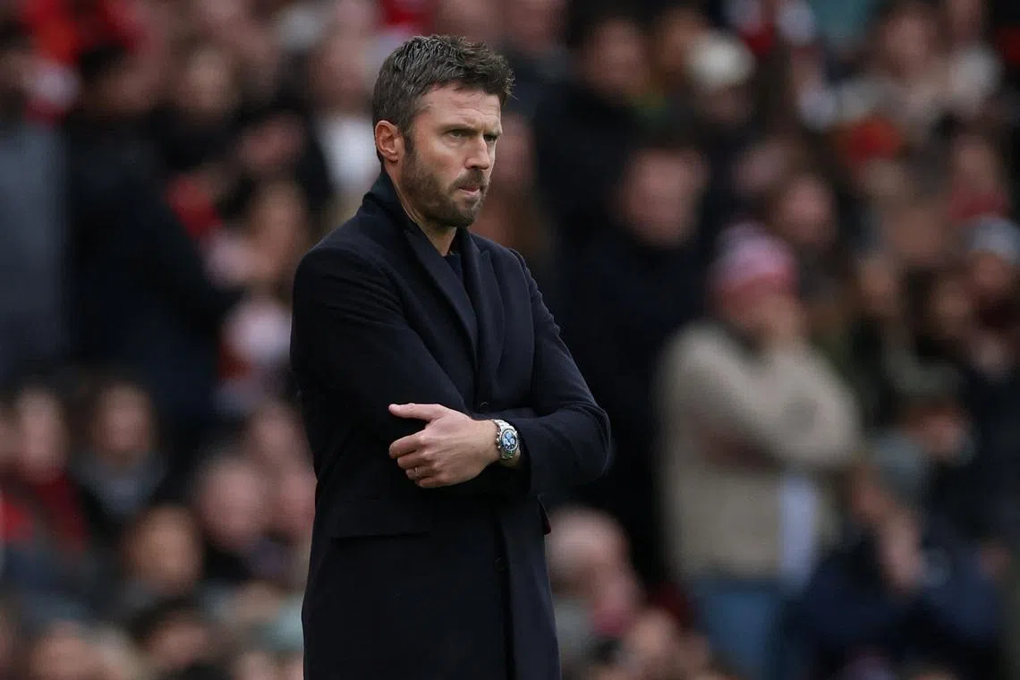 FILE PHOTO: Soccer Football - Premier League - Manchester United v Manchester City - Old Trafford, Manchester, Britain - January 17, 2026 Manchester United interim manager Michael Carrick looks on REUTERS/Phil Noble/File Photo