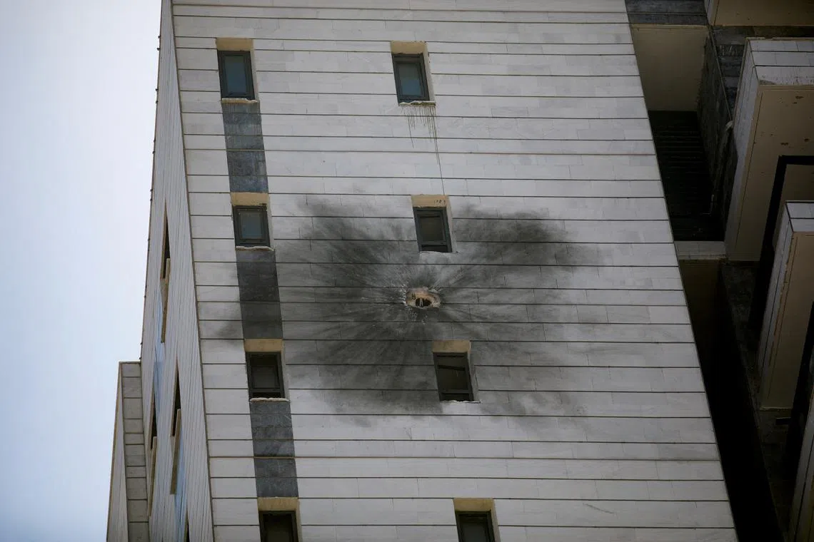 A view shows a damaged residential building, after projectiles attack towards Israel from Lebanon, amid cross-border hostilities between Hezbollah and Israeli forces, in Nahariya, northern Israel September 9, 2024. REUTERS/Shir Torem/File Photo