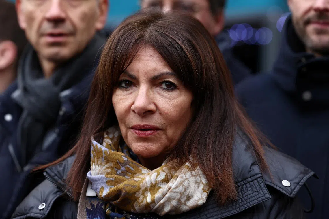 FILE PHOTO: Paris' Mayor Anne Hidalgo attends the launching of the planting of the first urban forest on the circular Place de Catalogne, as part of a multi-year plan to turn the French capital into a garden city, in Paris, France, December 6, 2023. REUTERS/Stephanie Lecocq/File Photo