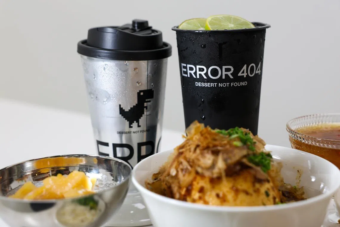 Error 404’s sticky rice green tea drinks, Candied Taro in Coconut Milk (front left) and Braised Pork Rice. 