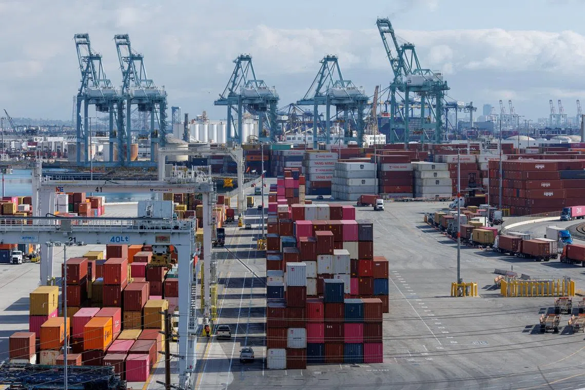 FILE PHOTO: A drone view shows shipping containers from China, at the China Shipping (North America) Holding Company Ltd. facility at the Port of Los Angeles in Wilmington, California, February 4, 2025. REUTERS/Mike Blake/File Photo