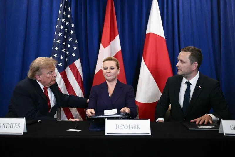 (From left) US President Donald Trump, Denmark’s Prime Minister Mette Frederiksen and Greenland‘s Prime Minister Jens-Frederik Nielsen at the signing of a trilateral security deal in New York on Sept 22.