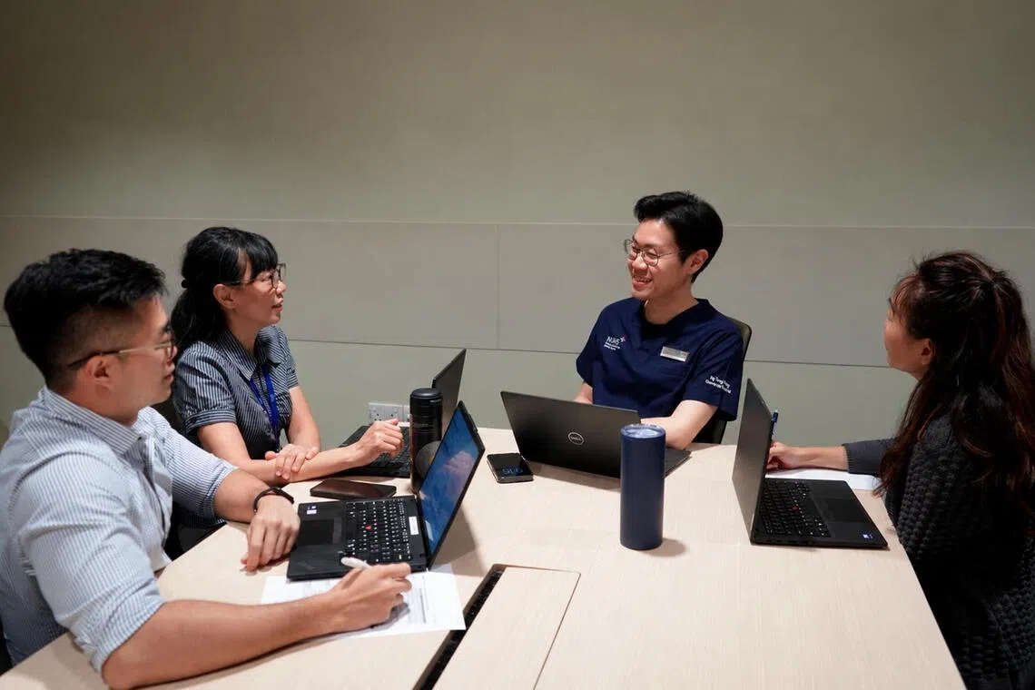 Darryl Tan (second from right) also advocates for ways to improve patient experience in the hospital.