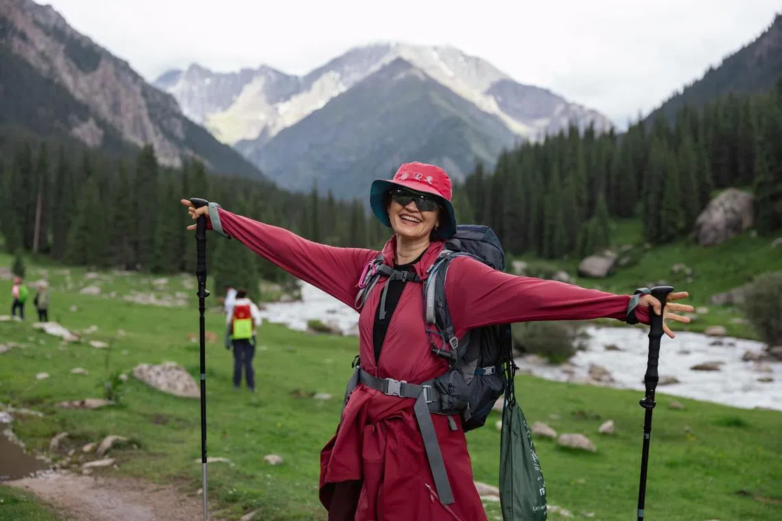 Breast cancer survivor Irina Karpova, 50, went on a group trek in Kyrgyzstan in July 2024 to raise funds for the Breast Cancer Foundation. 

CREDIT: Courtesy of Irina Karpova