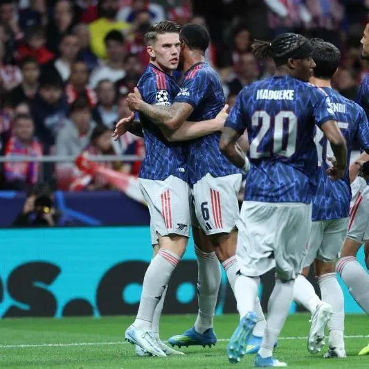 Arsenal players celebrate the opening goal scored by Arsenal's Swedish forward Viktor Gyokeres (left) during the UEFA Champions League semi-final first leg match against Atletico de Madrid.