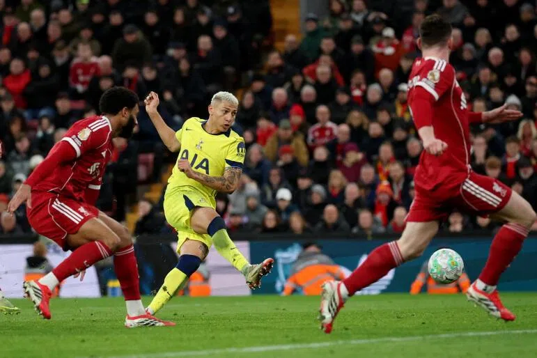 Tottenham Hotspur's Richarlison scores their first goal against Liverpool.