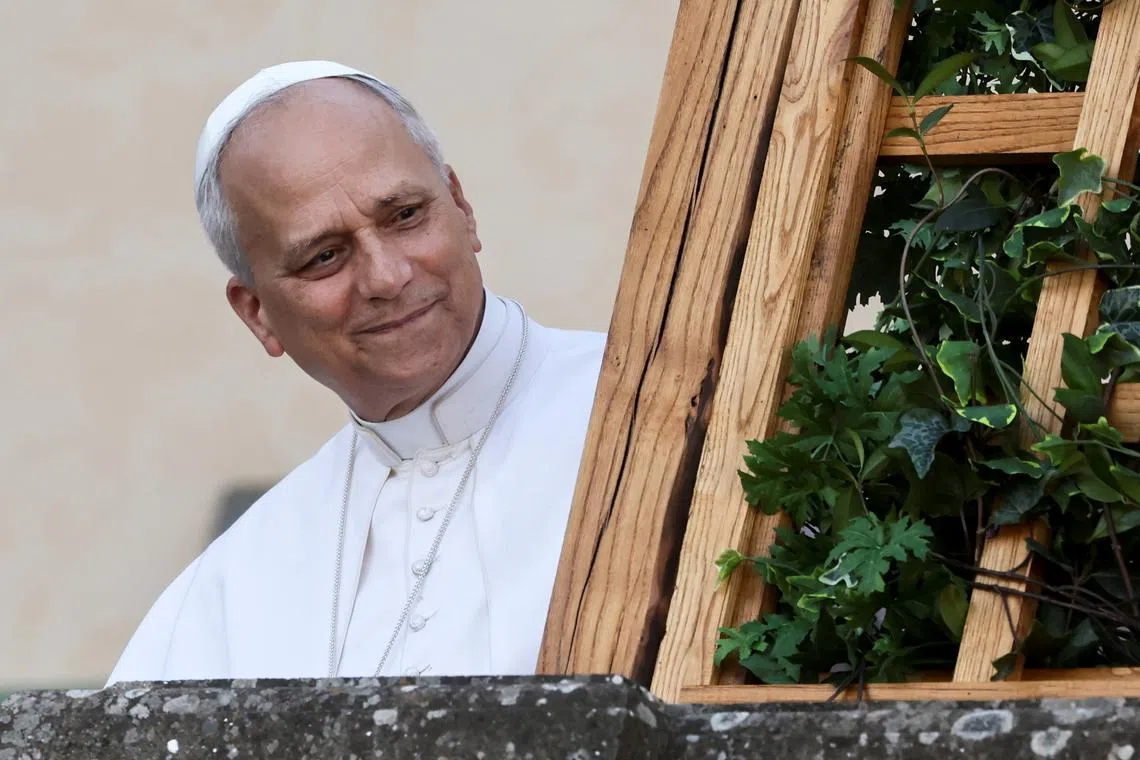 FILE PHOTO: Pope Leo XIV smiles as he arrives at Castel Gandolfo, a hill town on the shores of Lake Albano, where he will be spending two weeks of vacation, in Castel Gandolfo, Italy, July 6, 2025. REUTERS/Vincenzo Livieri/File Photo