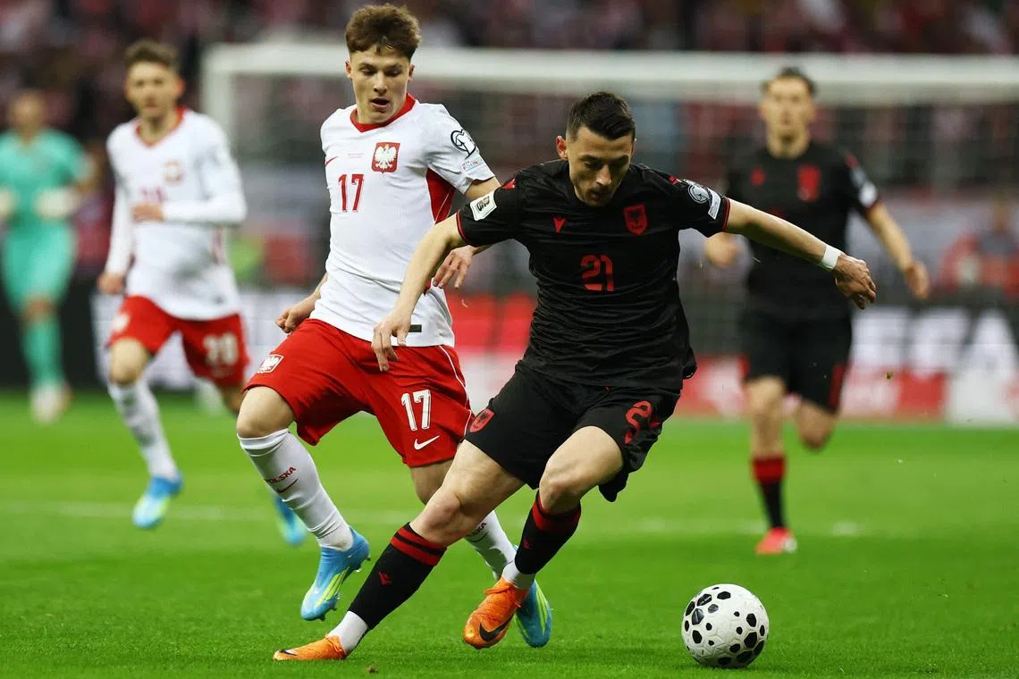 Poland come from behind to beat Albania and reach playoff final