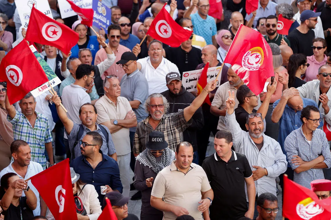 FILE PHOTO: Demonstrators take part in a protest led by the Tunisian General Labour Union (UGTT), demanding the restoration of democracy and denouncing mounting restrictions on freedoms, intensifying pressure on President Kais Saied amid a deepening economic and political crisis, in Tunis, Tunisia, October 17, 2026. REUTERS/Zoubeir Souissi/File Photo