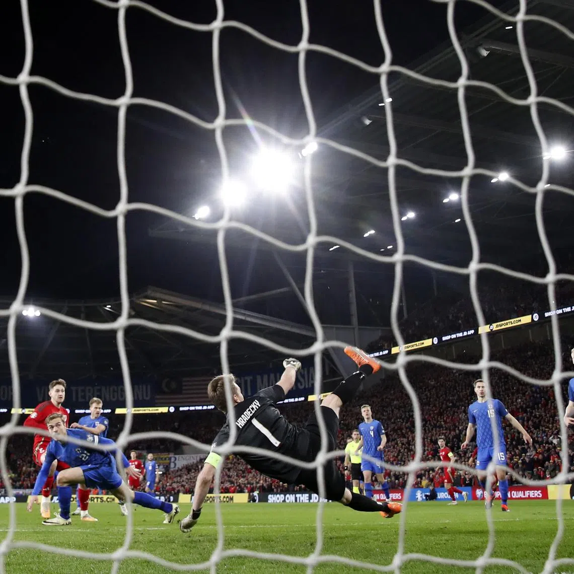 Soccer Football - Euro 2024 Qualifier - Play-Off - Wales v Finland - Cardiff City Stadium, Cardiff, Wales, Britain - March 21, 2024 Wales' David Brooks scores their first goal REUTERS/Paul Childs