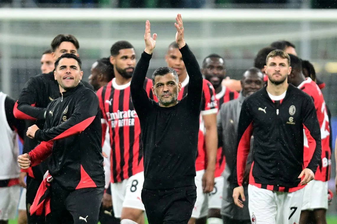 Soccer Football - Coppa Italia - Semi Final - Second Leg - Inter Milan v AC Milan - San Siro, Milan, Italy - April 23, 2025 AC Milan coach Sergio Conceicao celebrates after the match REUTERS/Daniele Mascolo