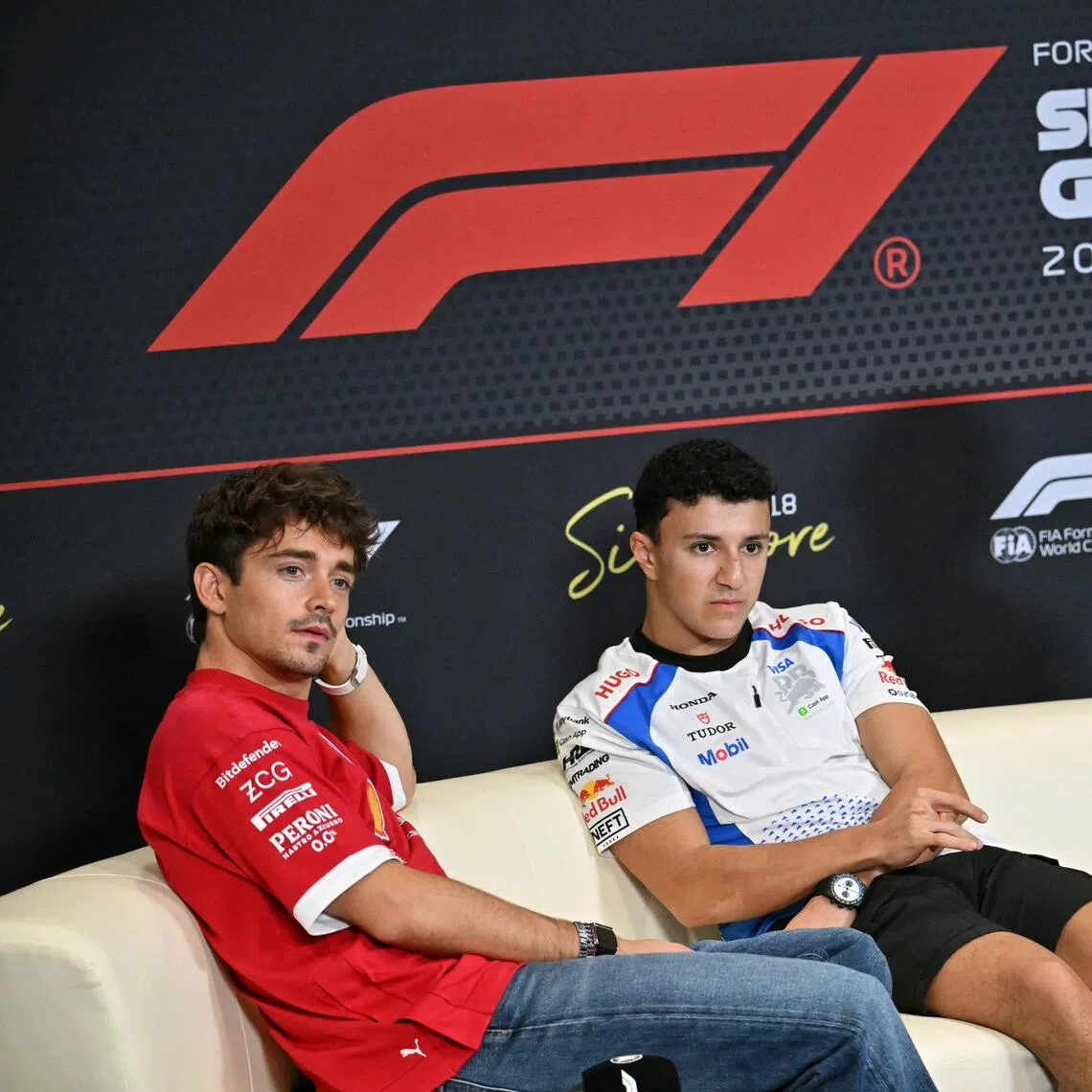 (From left) Charles Leclerc, Isack Hadjar and Alex Albon at a press conference at the F1 Pit Building on Oct 2.