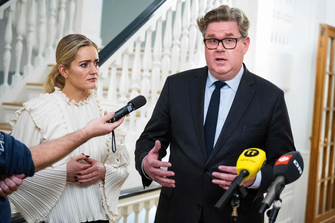 Sweden's Justice Minister Gunnar Strommer (right) speaking on Dec 9 about the recruitment of children and young people via social media for organized crime, with Denmark's Justice Minister Emilie Enger Mehl.