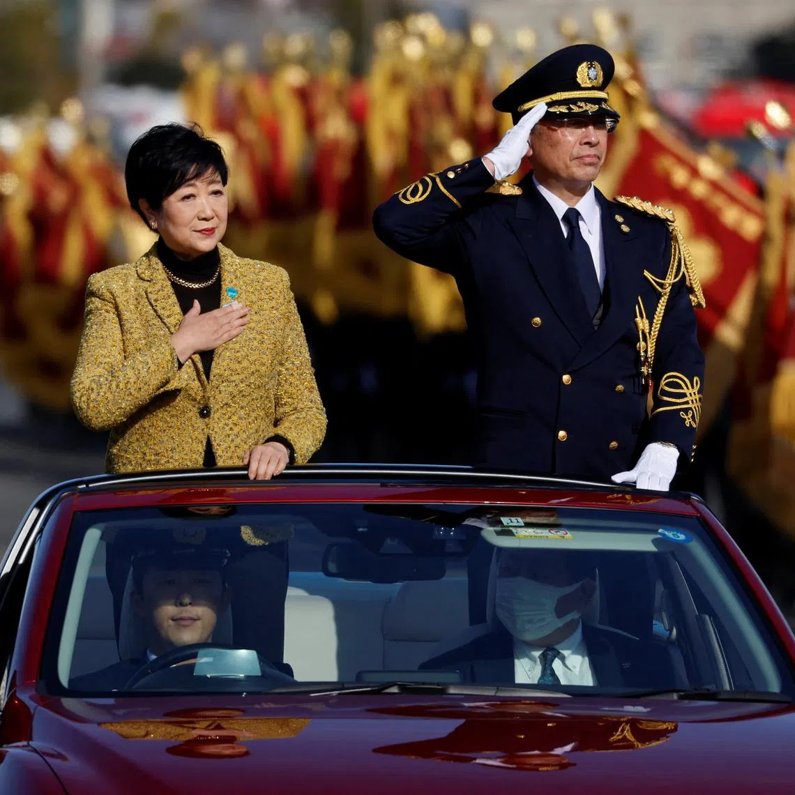 Tokyo Governor Yuriko Koike inspects the Tokyo Fire Department's New Year's Fire review in Tokyo, Japan January 6, 2023.  REUTERS/Issei Kato/File Photo