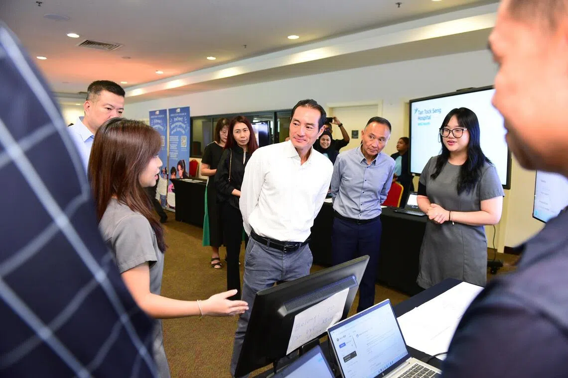 azite28 - Student from Higher Nitec in Customer Experience presenting an AI-powered chatbot developed with NHG Health’s Khoo Teck Puat Hospital to Senior Minister of State for Health and Digital Development and Information Mr Tan Kiat How.
Credit: ITE