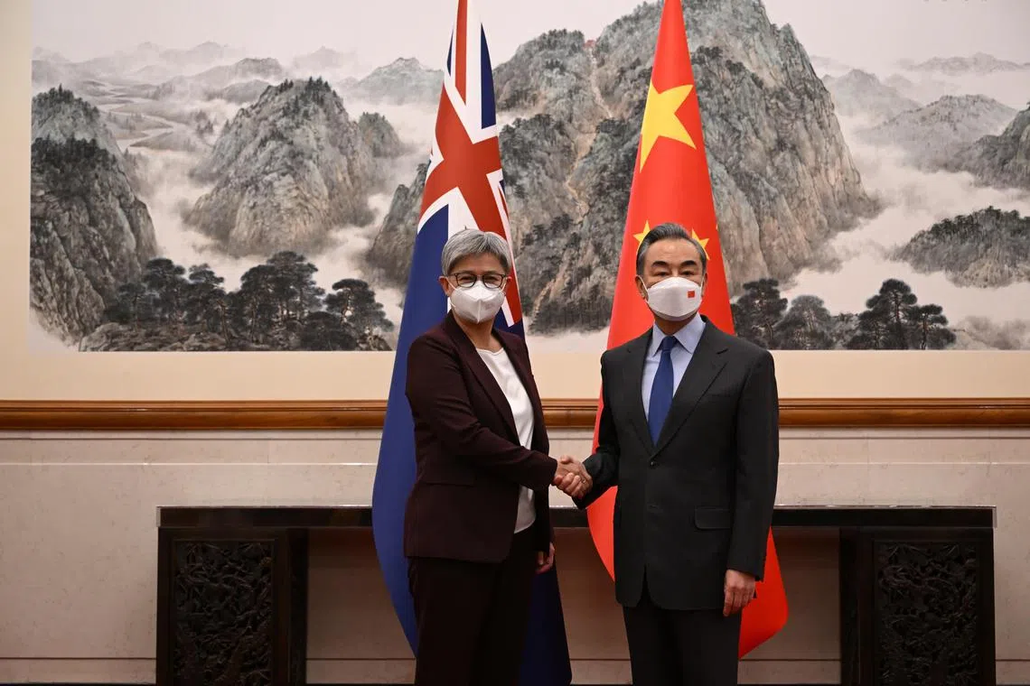 Australian Foreign Minister Penny Wong (left) with with Chinese Foreign Minister Wang Yi at Diaoyutai State Guesthouse in Beijing on Dec 21. 